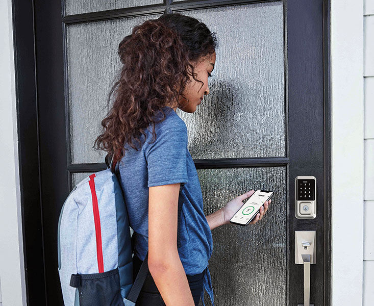 Girl with Weiser Smart Locks